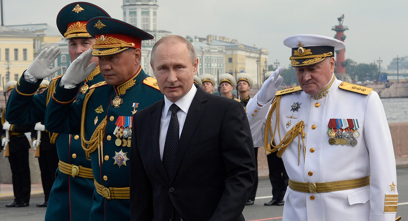 Vladimir Putin and military officers